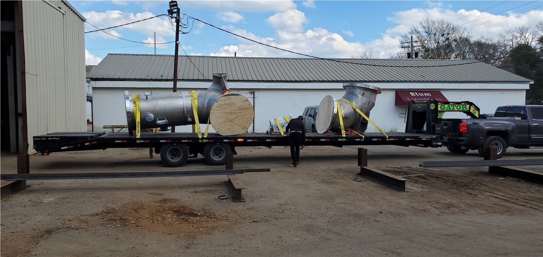 Coated ductwork pieces staged for shipment