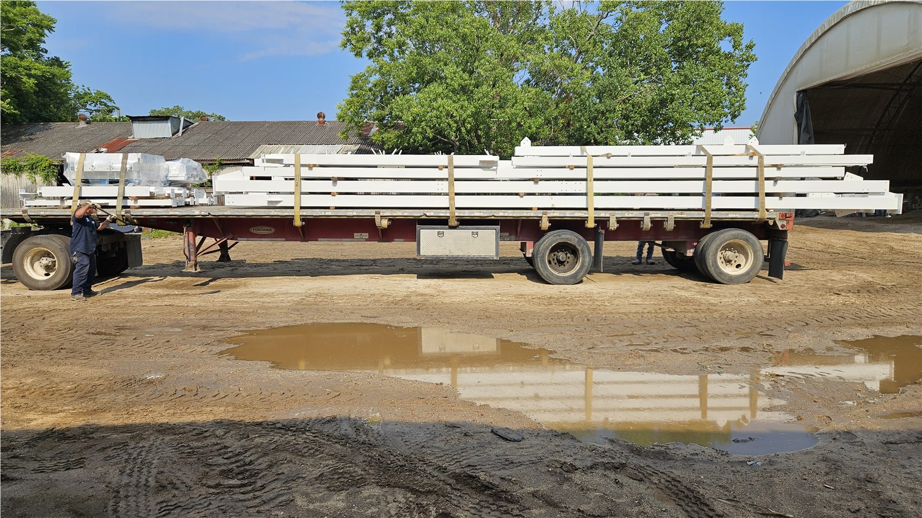 Fabricated steel members staged on a trailer