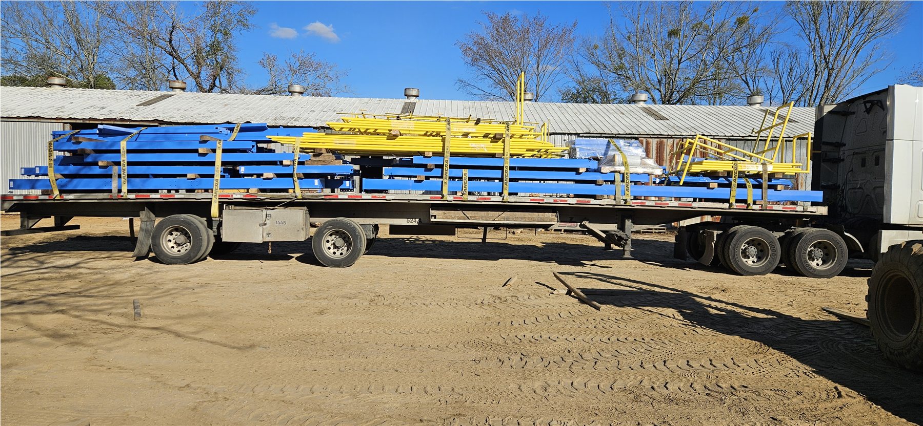 Packaged structural steel on a trailer