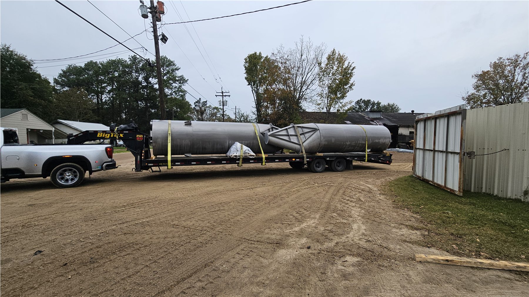 Steel components staged and loaded for project delivery
